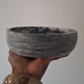 Coupe en jesmonite grise stock